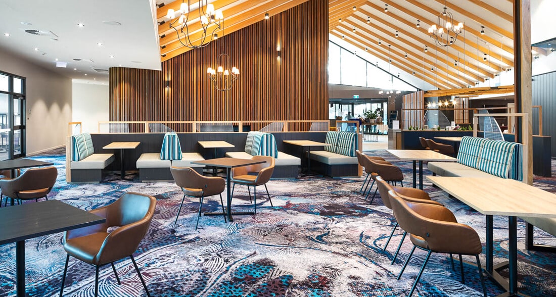 Custom Carpets for Hospitality Flooring | Woven Axminster Carpet by Signature Floors | Blue Hotel Lobby Carpet | Club Lounge Carpet | Blue Brown custom commercial carpet 